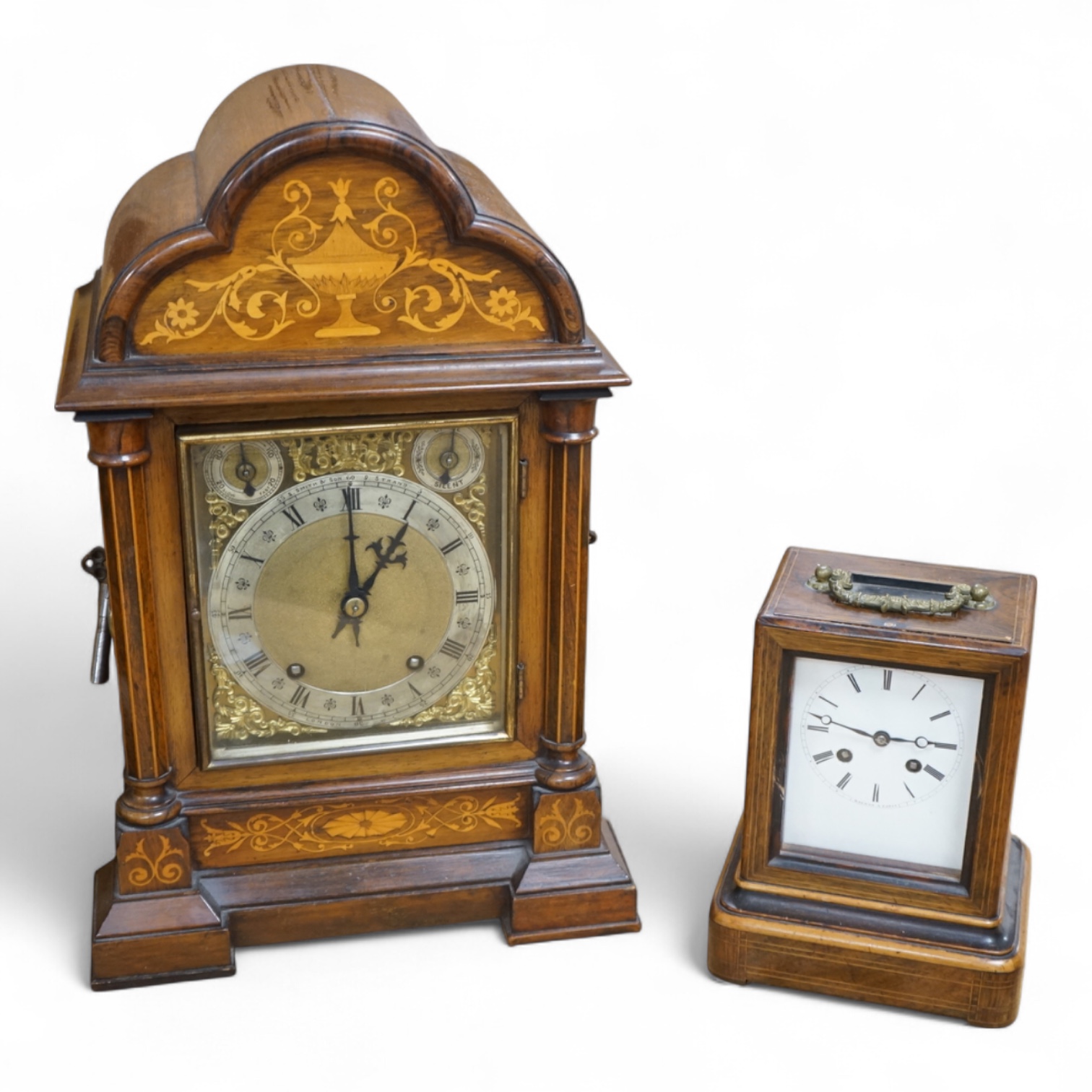 A rosewood mantel clock with French silk suspension movement, together with an Edwardian marquetry bracket clock signed to the dial S.Smith and son, Strand, London with a two train German movement striking on two coiled